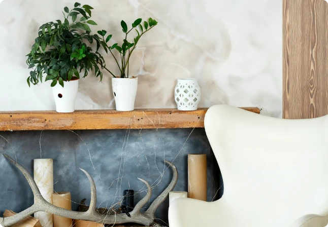 Roman clay wall with a soft mottled stone texture above a mantel